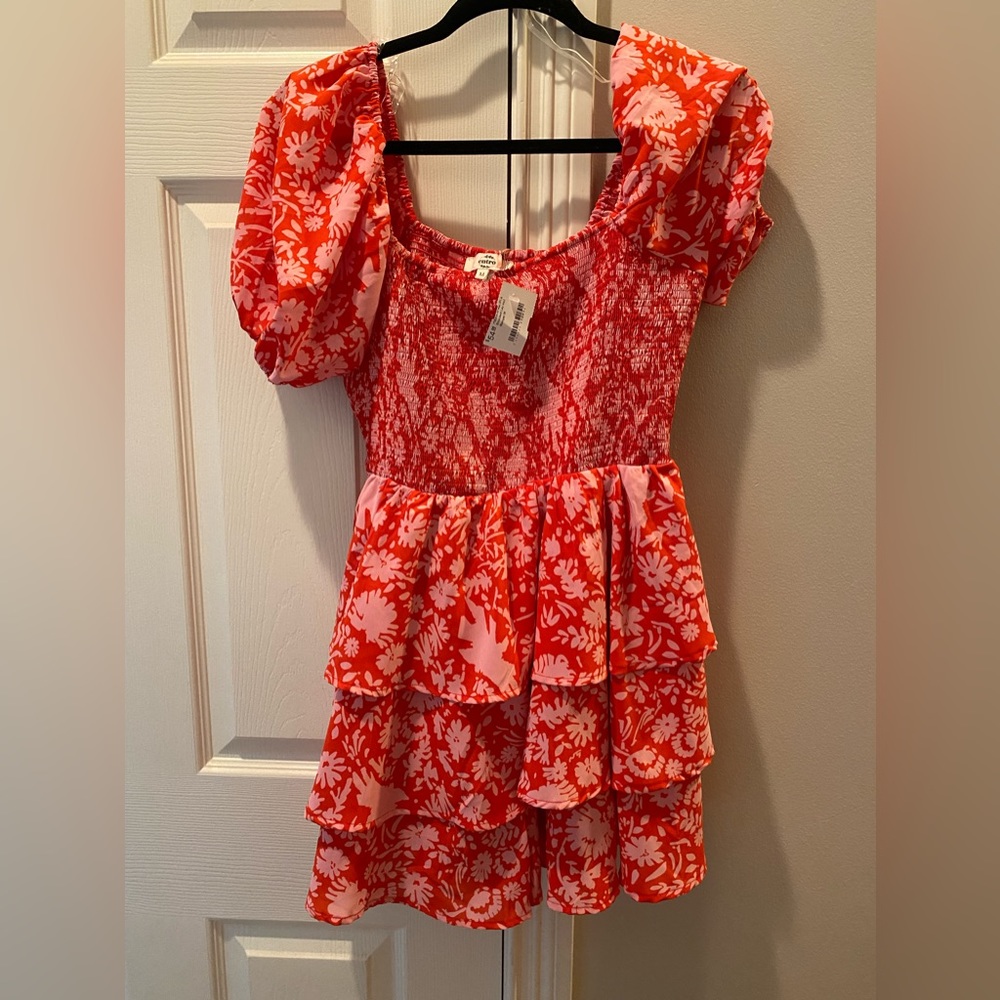 Medium floral smocked romper NWT